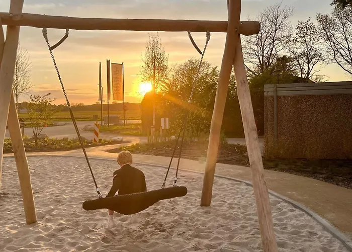 Family Near Lake, And Dunes *